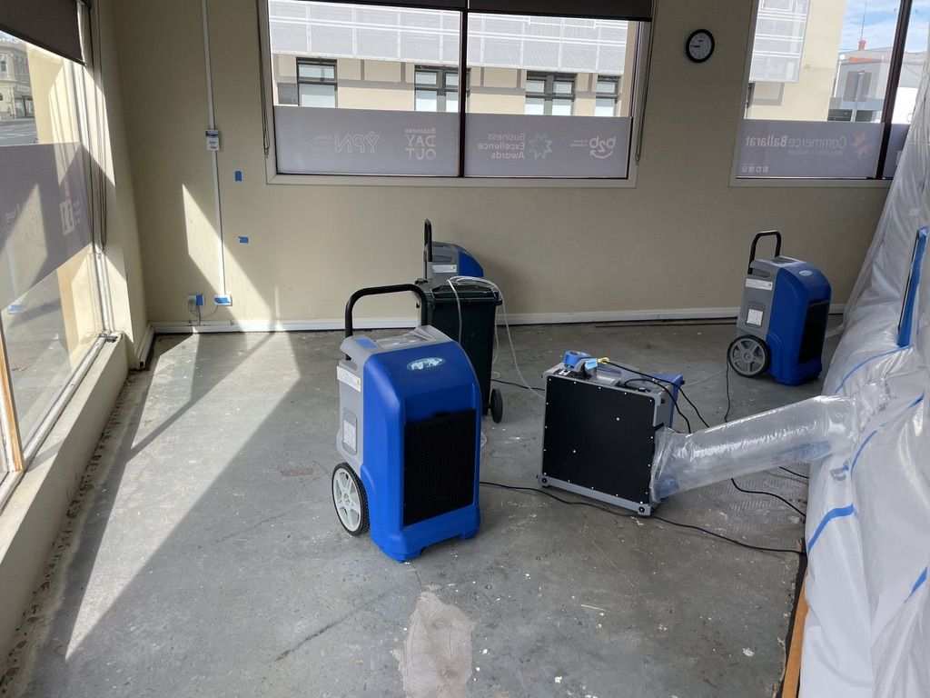 Structural drying with dehumidifiers and air movers